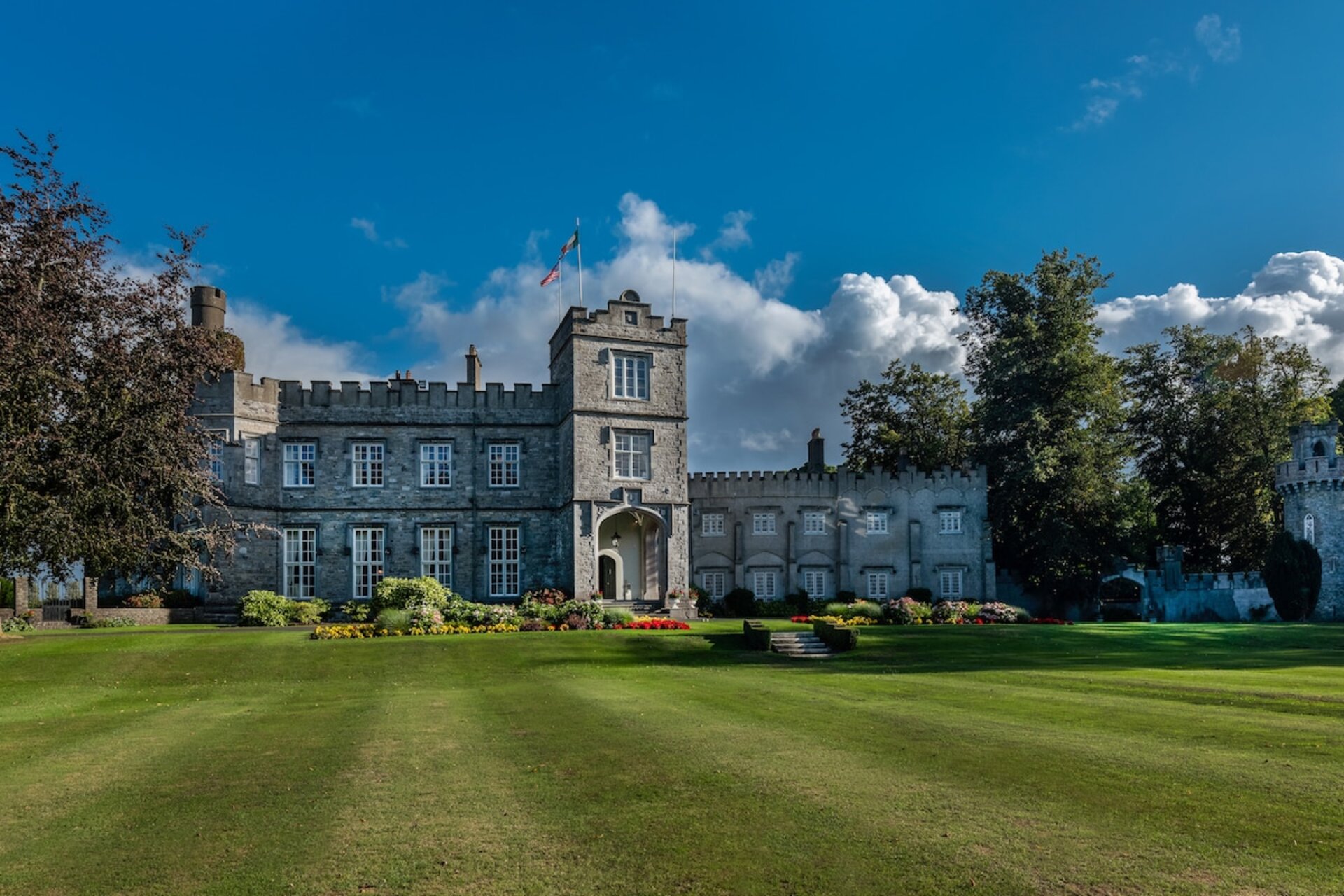 Exclusive Ireland villa rental overlooking rolling meadows and a quiet countryside horizon