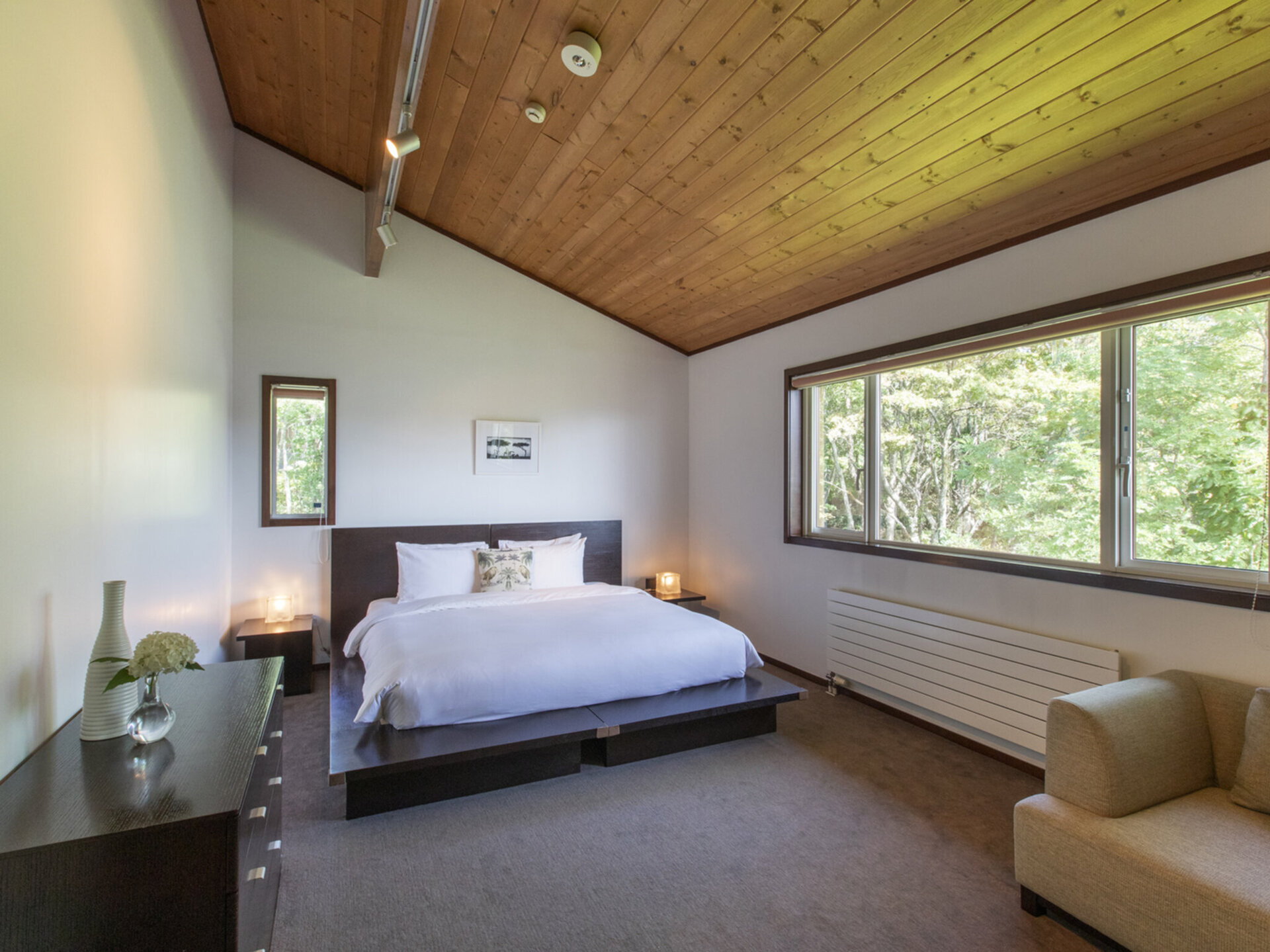 Casa La Mount  - Restful guest bedroom with a forest view