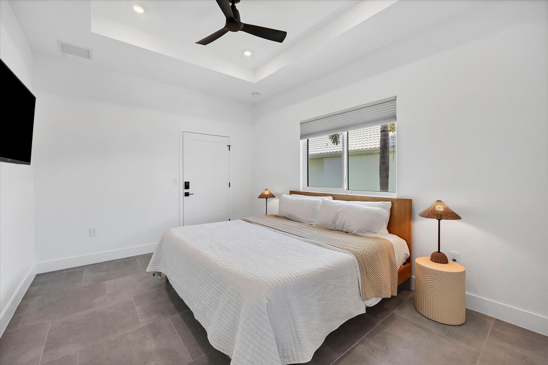 Guest bedroom with king bed. The king guest bedroom can be closed off to make it a suite