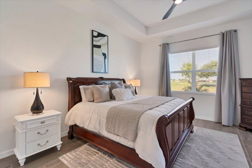 Primary bedroom with king bed, lanai access and ensuite
