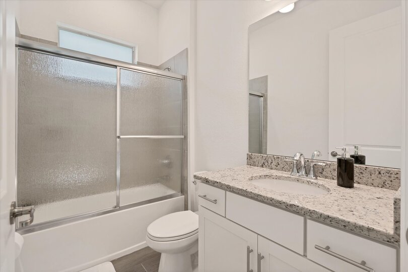 Guest bathroom with shower/tub combo
