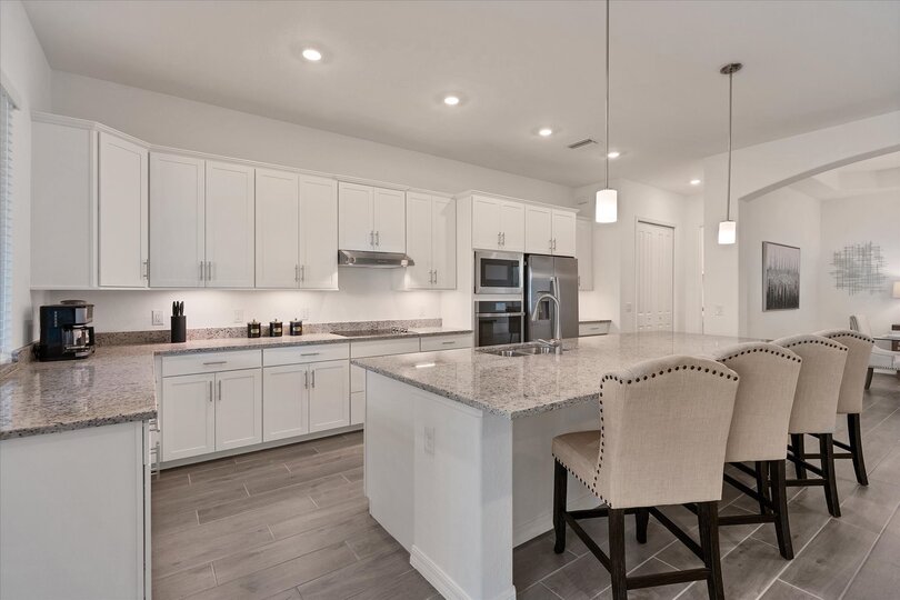 Gorgeous, fully-equipped kitchen with all new stainless steel appliances and large kitchen island that seats 4