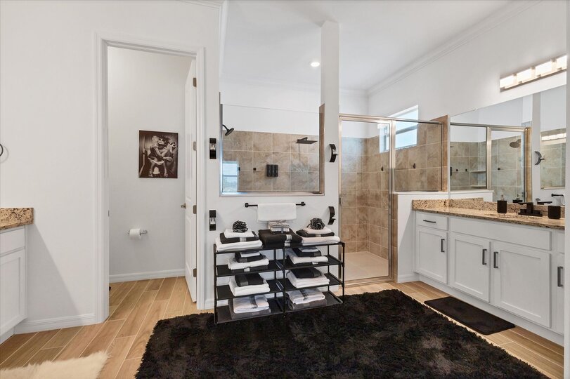 Beautiful, spacious en suite featuring walk-in shower and double vanities
