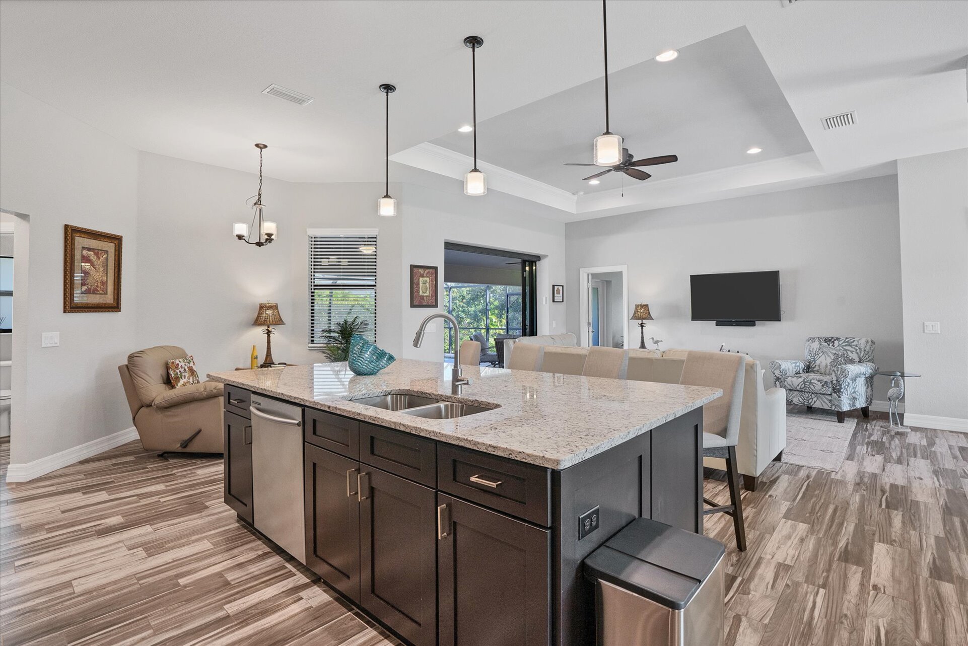 Gorgeous, fully-equipped kitchen featuring stainless steel appliances, and huge kitchen island that seats 4