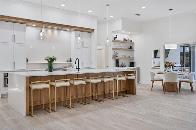 Bar stools at the Kitchen island seat 7
