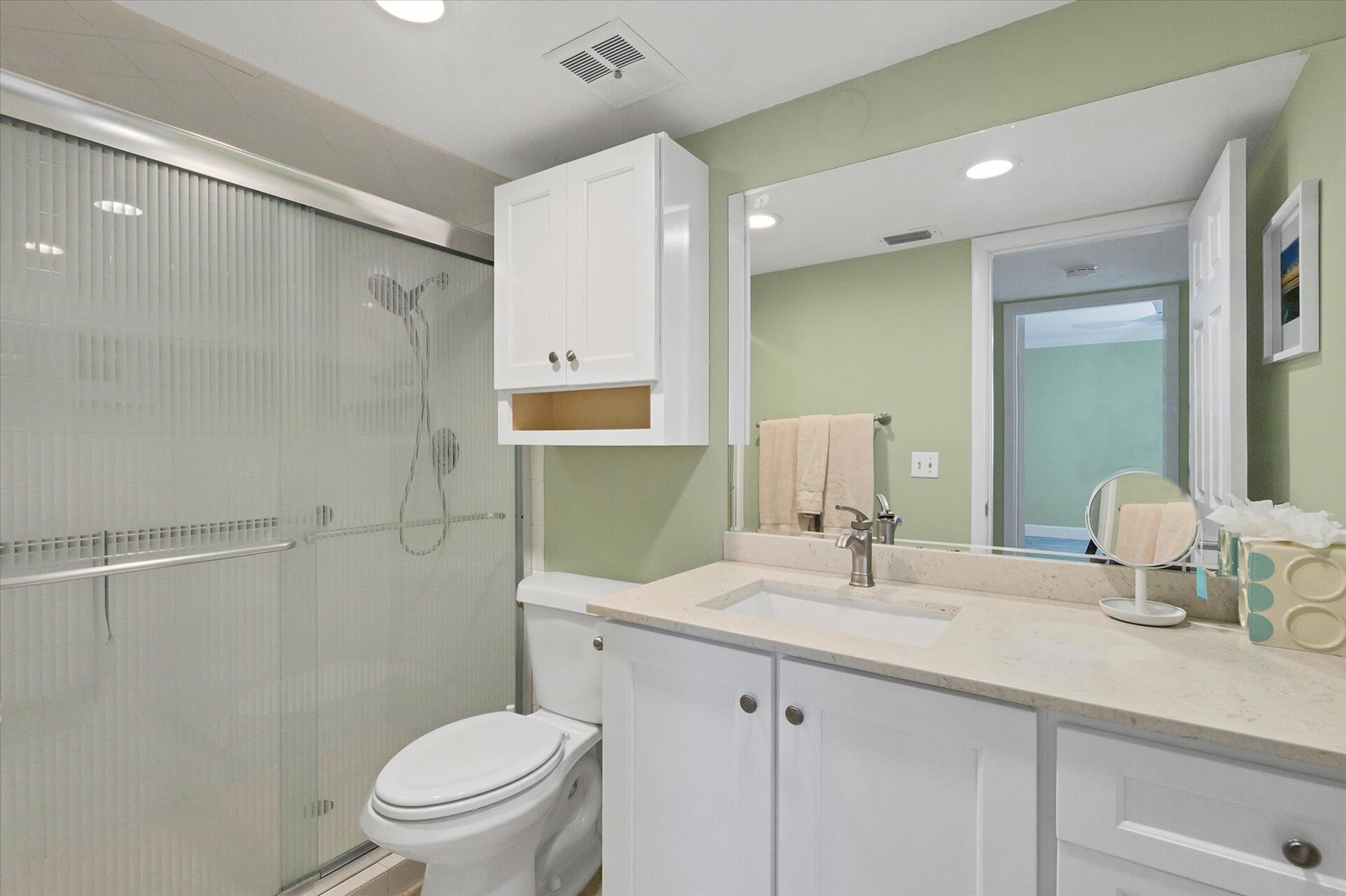 Shared bathroom with walk-in shower