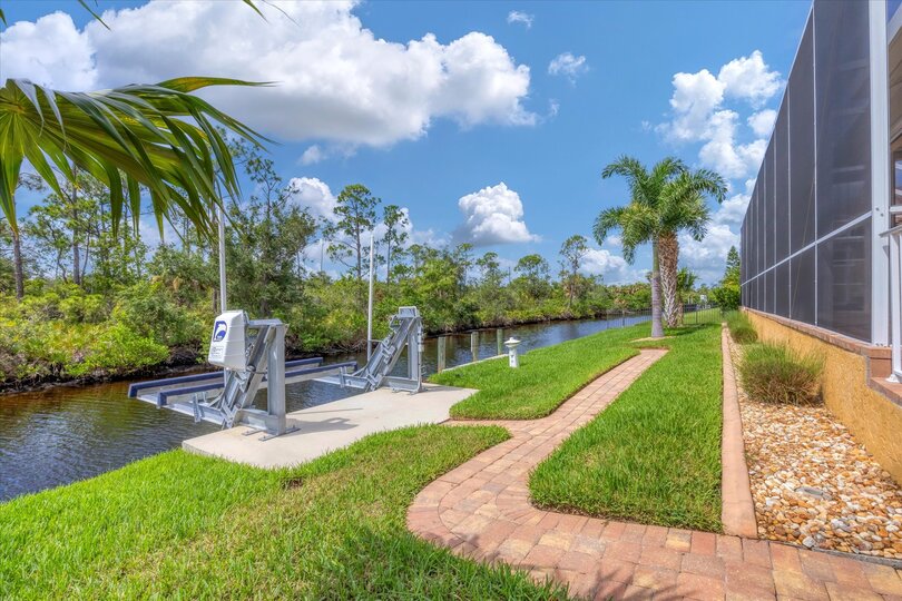 Path leading to boat dock. (Boat lift is not for guest use). Dock size is 14' x 6'. Dock also fish lights