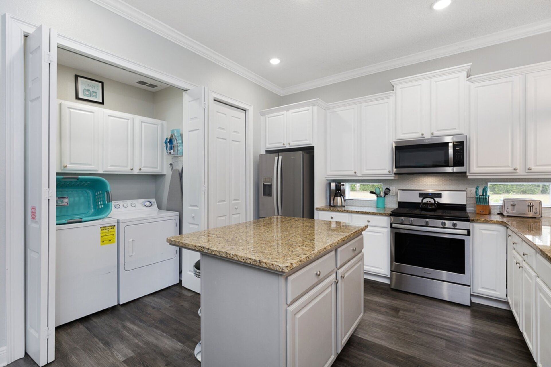 Washer and dryer located in the kitchen