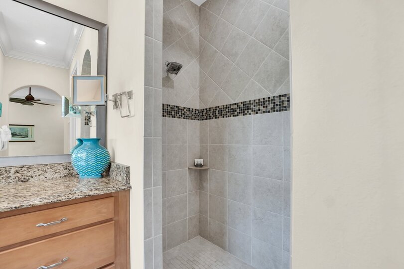 Walk into your shower or soak in the large bathtub