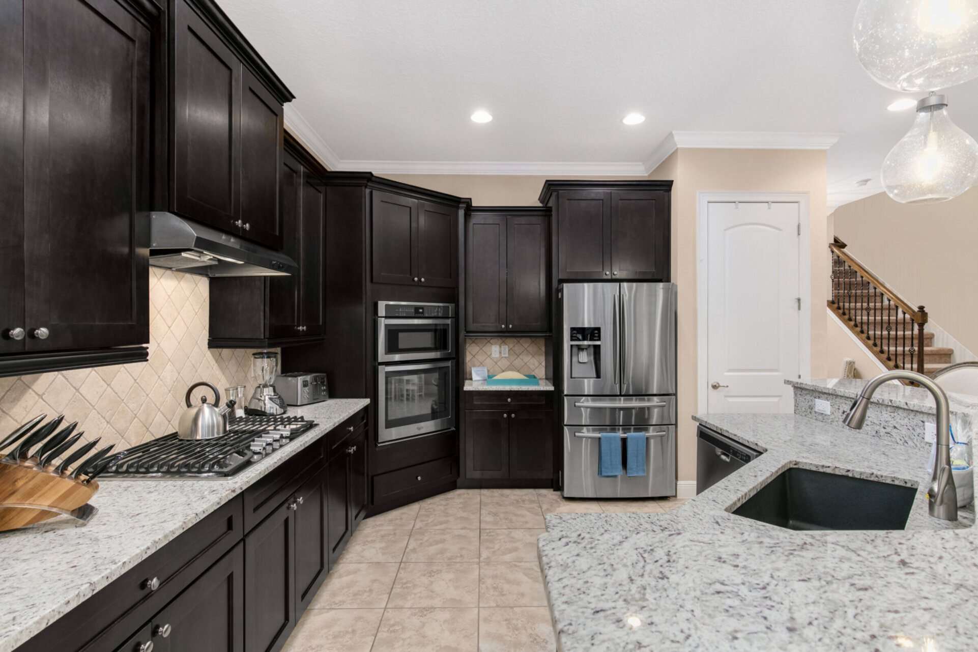 The upgraded kitchen has stainless steel appliances, granite counters and everything you need to prepare something great
