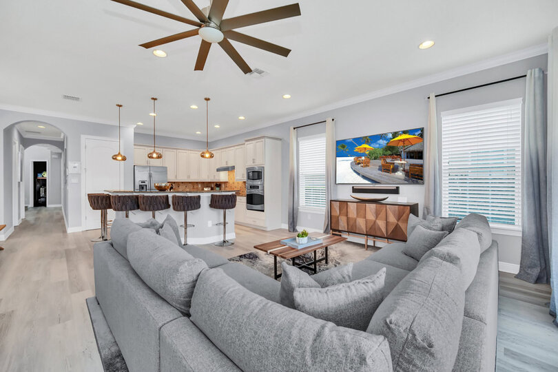 The open living area is perfect for your vacation with ample seating