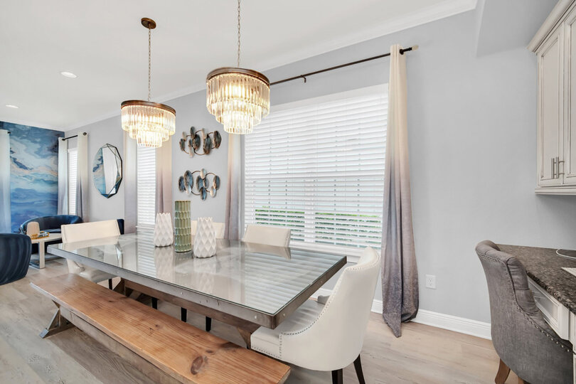 Gather around this formal dining table offering seating for 10