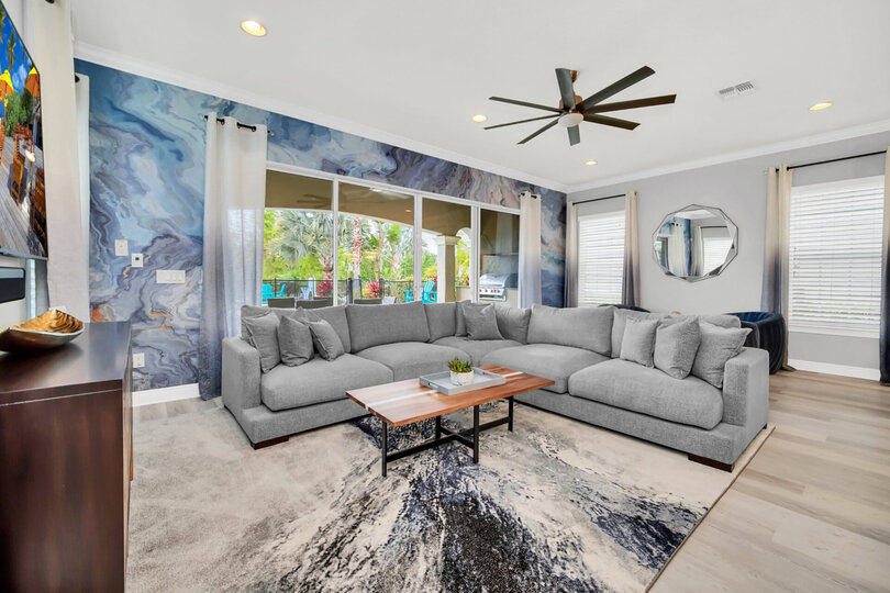 The living area opens out to your private west-facing pool deck