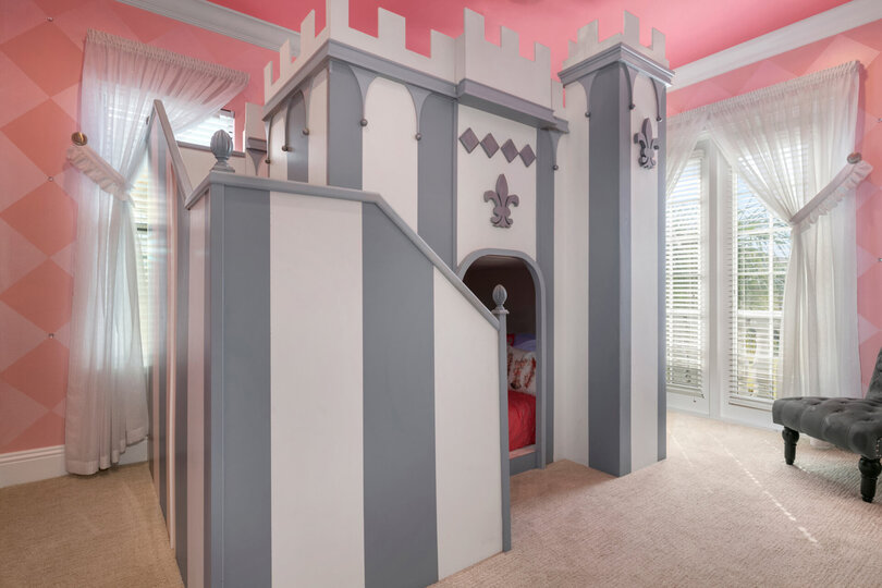 The princess room has a custom built full over full bunk bed