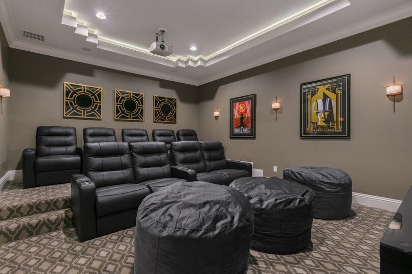 Host a movie night with leather recliners to seat 9