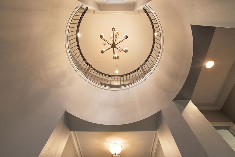 The custom home features breathtaking architectural details
