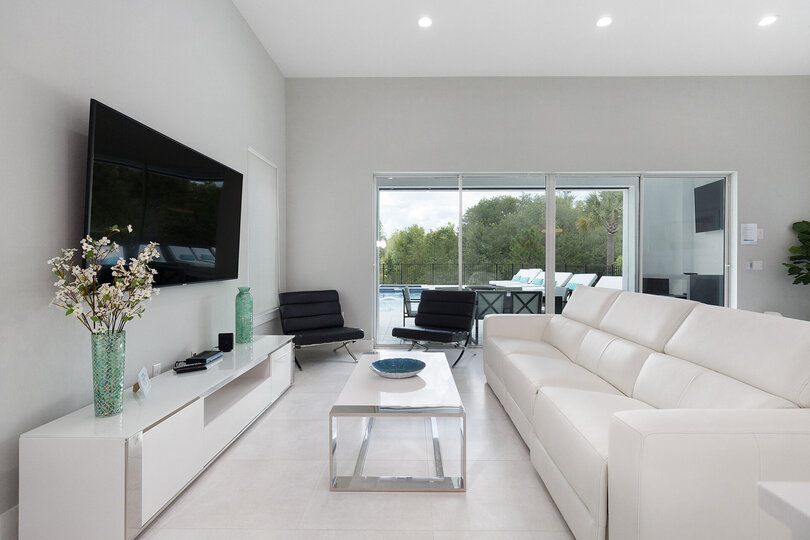 Cool off on the leather sofa seating in the living area