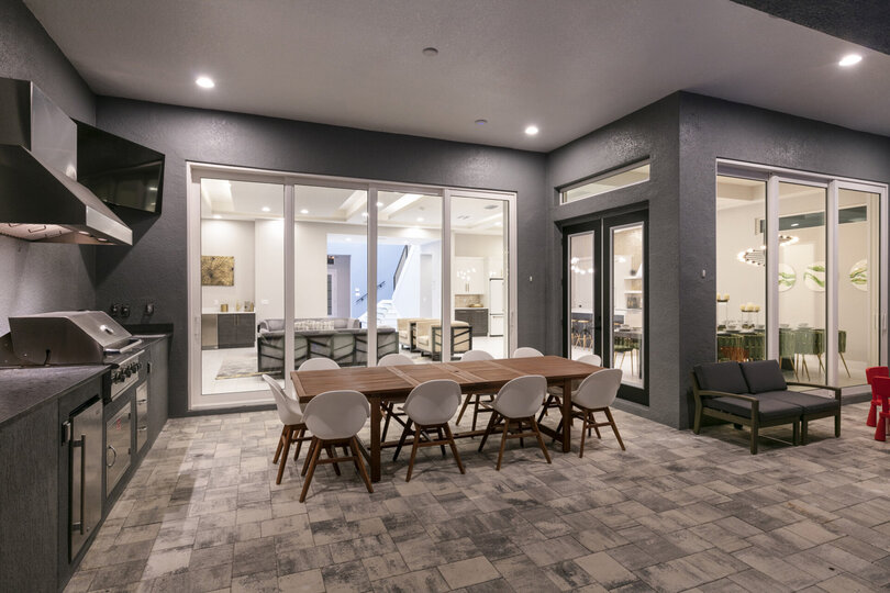 Dine al fresco under the exterior lighting