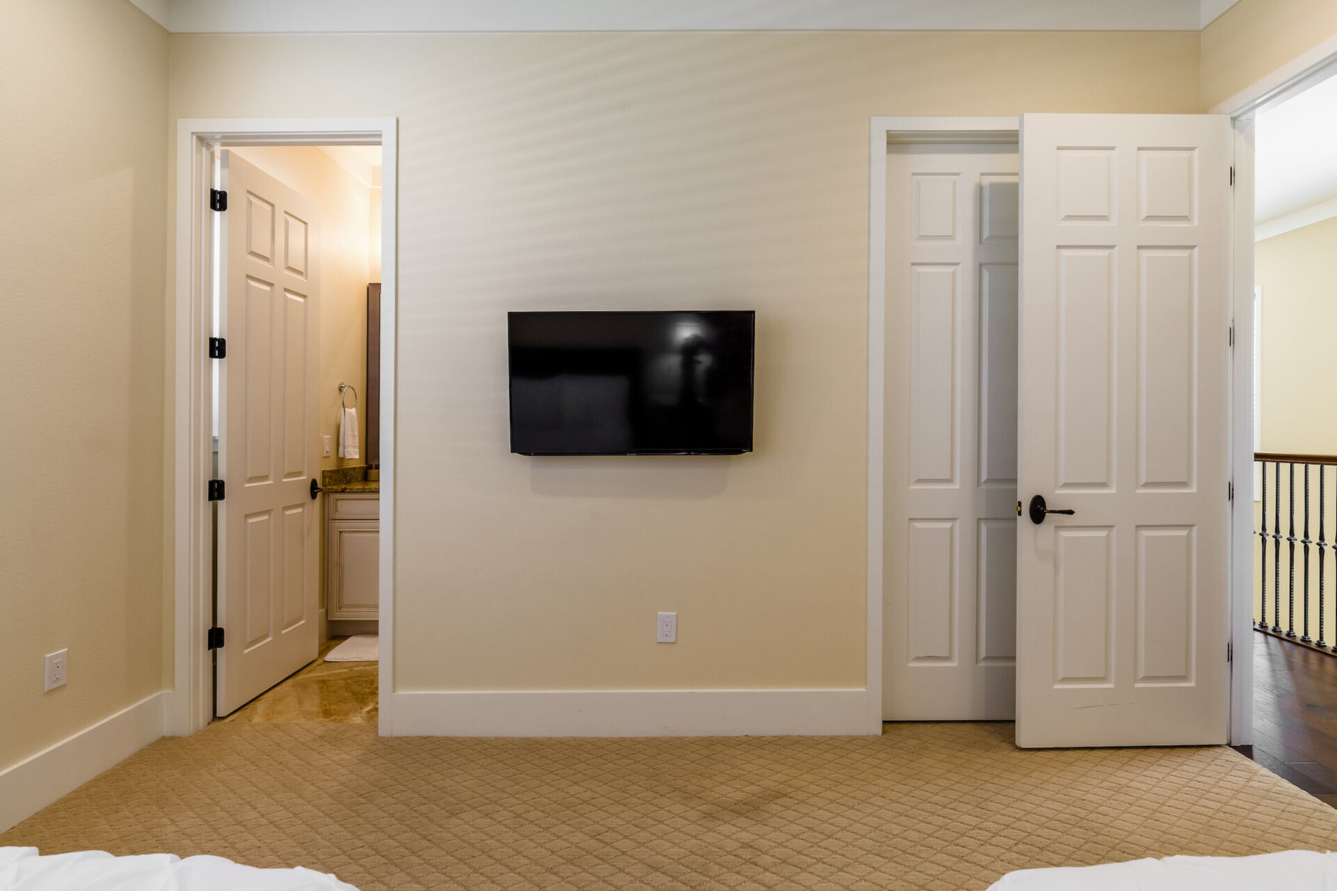 The room has a large closet and ensuite bathroom