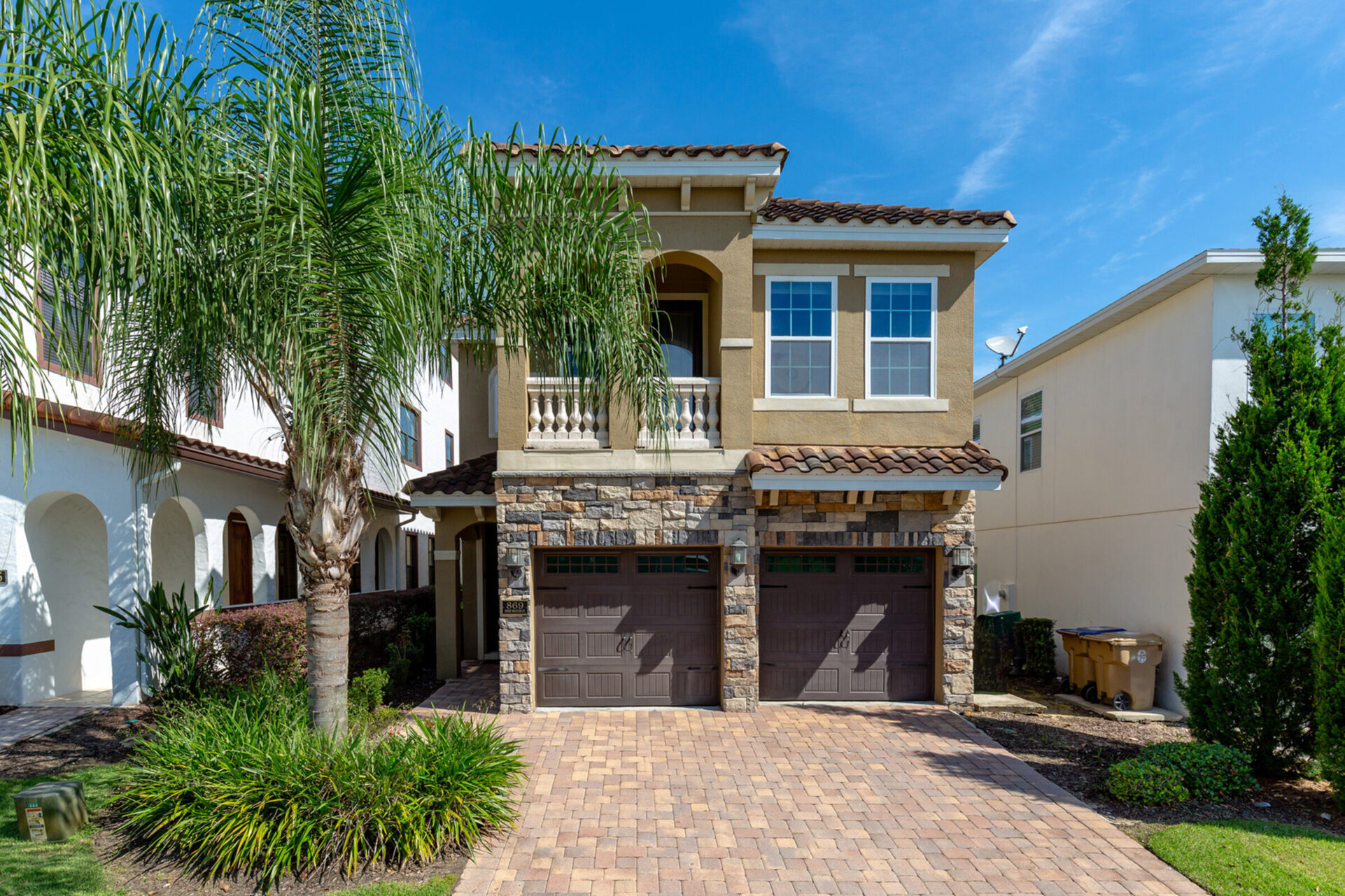 Large driveway has space for the multiple cars your family may be traveling in