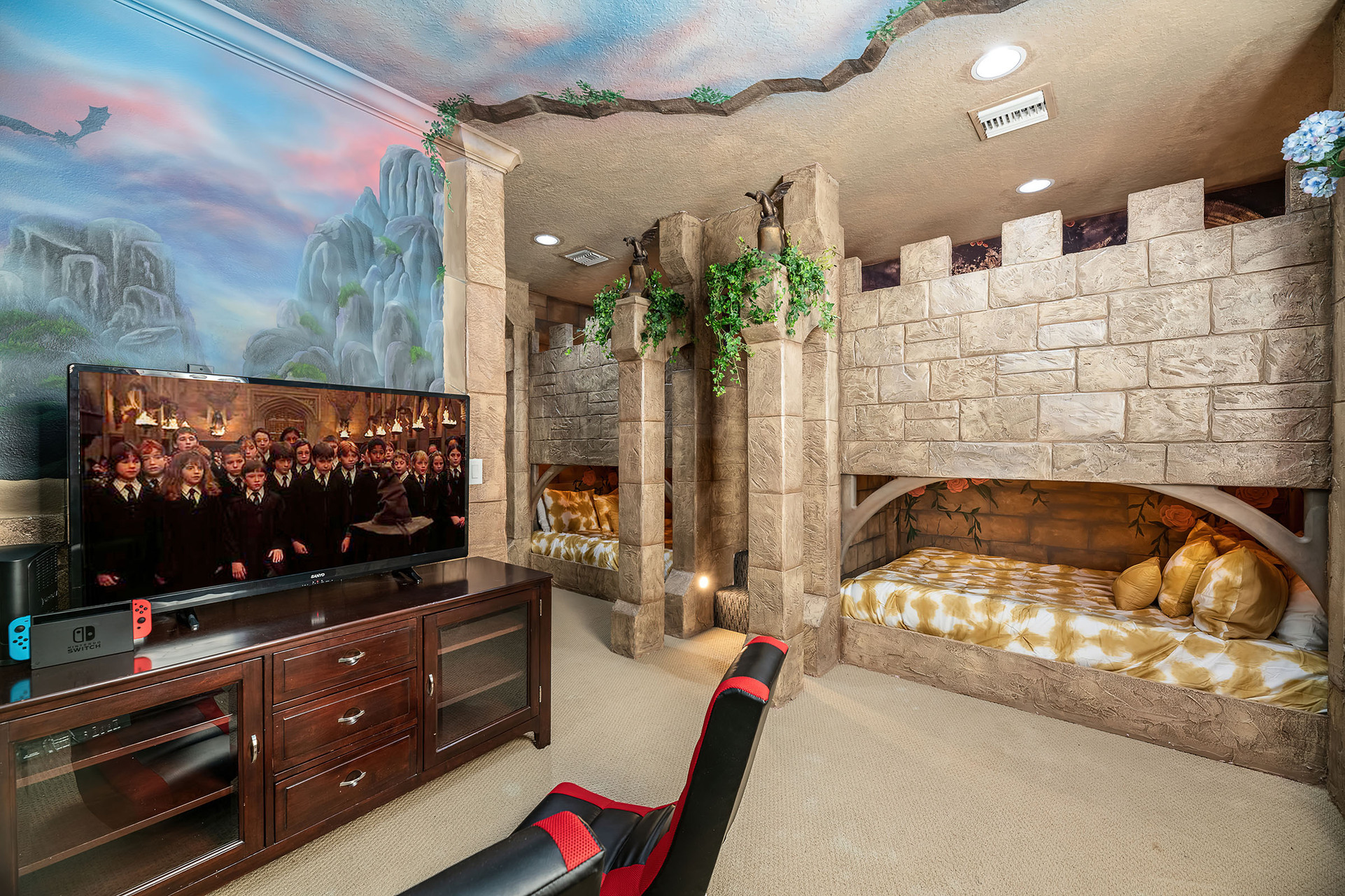 On the second floor, kids will feel like royalty in their very own castle-themed bedroom with double/double bunk beds x2