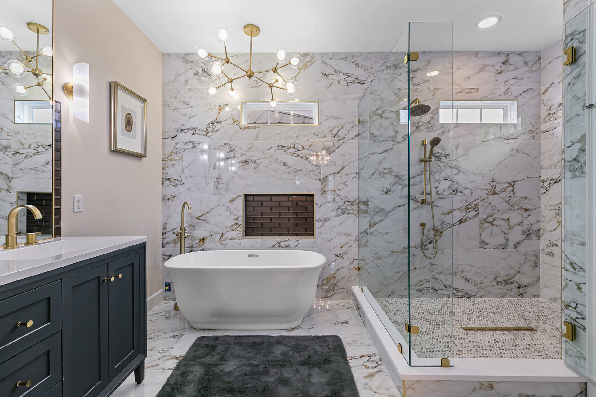 Large walk in shower with double shower heads.
