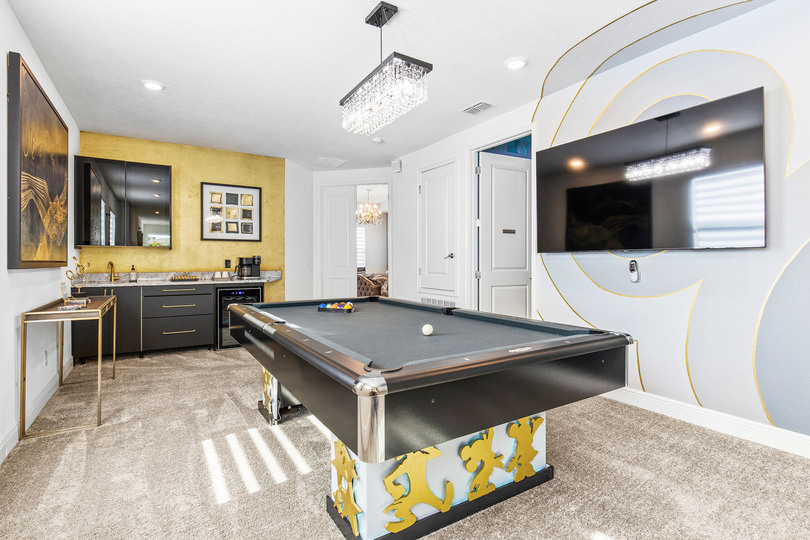 "Mickey's Dream" is the perfect hangout space with a pool table and large TV.