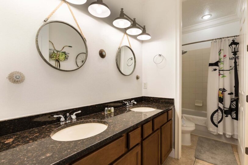Enjoy the convenience of an en-suite bathroom featuring a walk-in shower for a refreshing start to your day