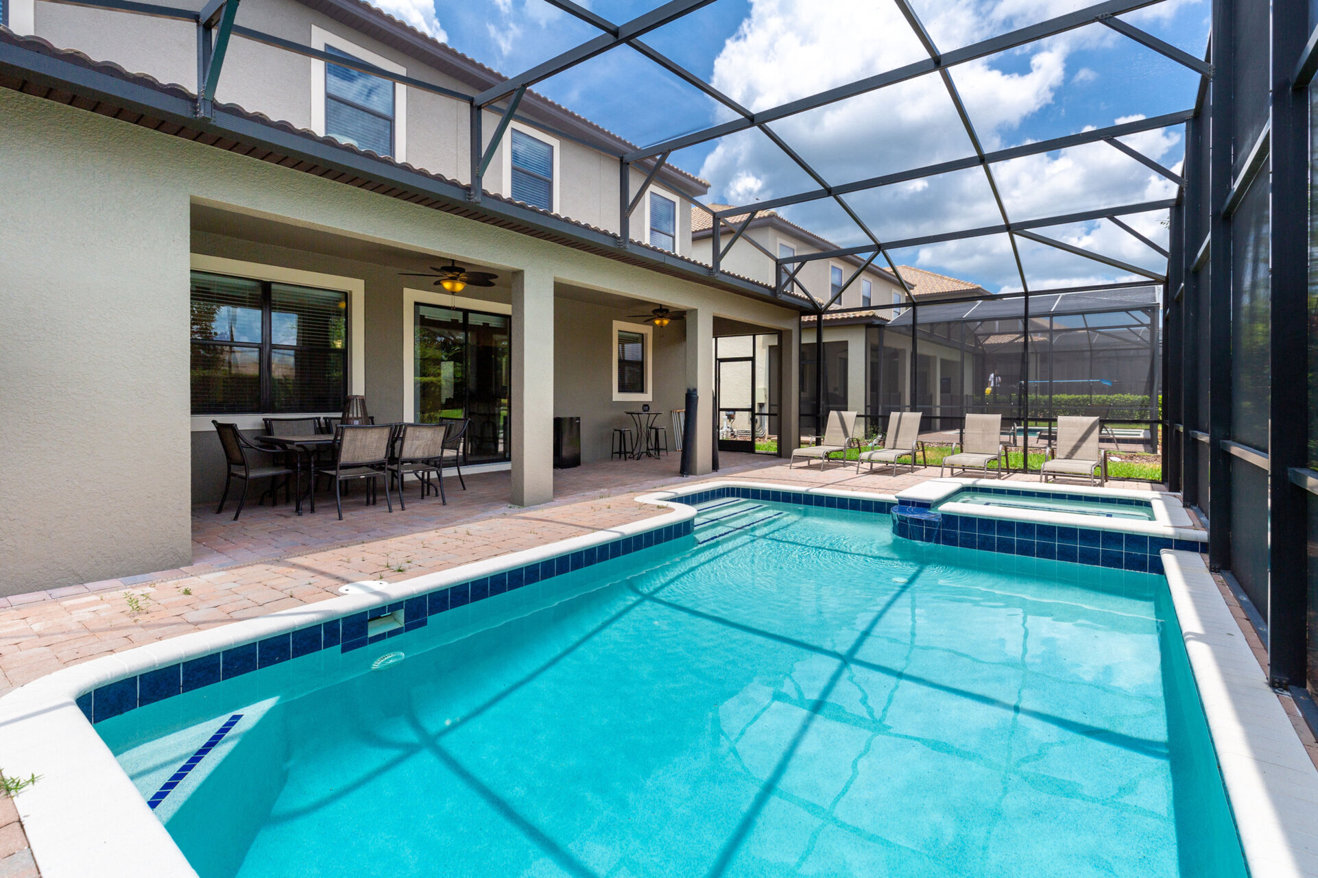 Enjoy a drink poolside at the dining table for 6