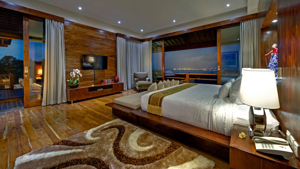 Restful master bedroom with stunning ocean view
