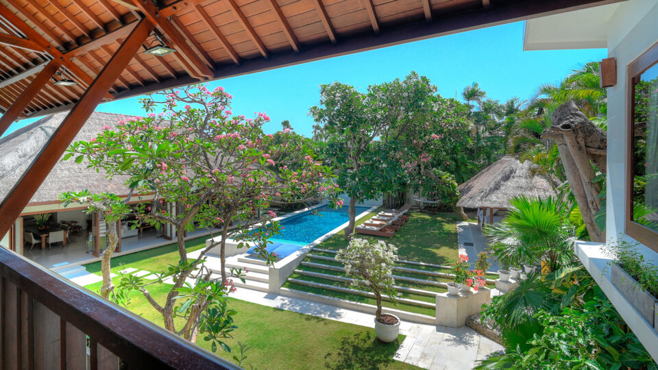Master suite pavilion stairwell with a view of the pool