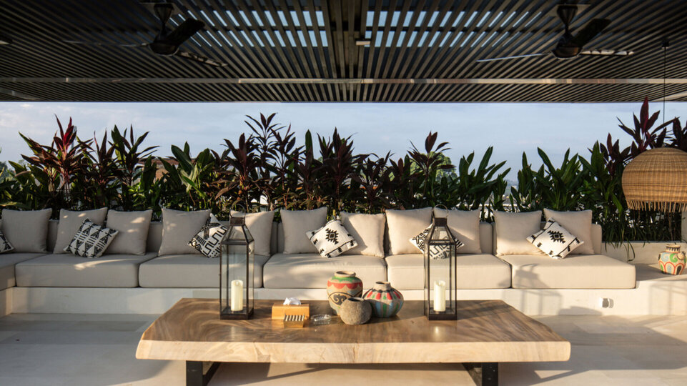 Relax and watch the stunning sunset in the rooftop sala