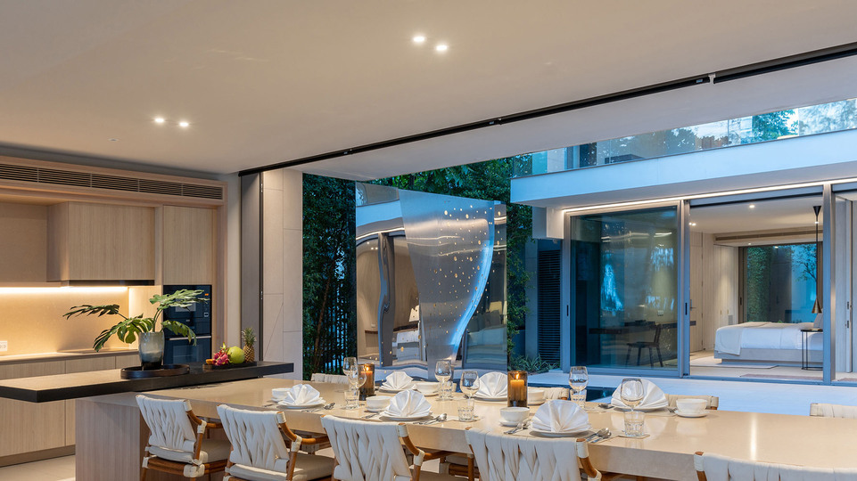 Veyla Beach Villa 6 - Inviting dining area by the reflecting pond