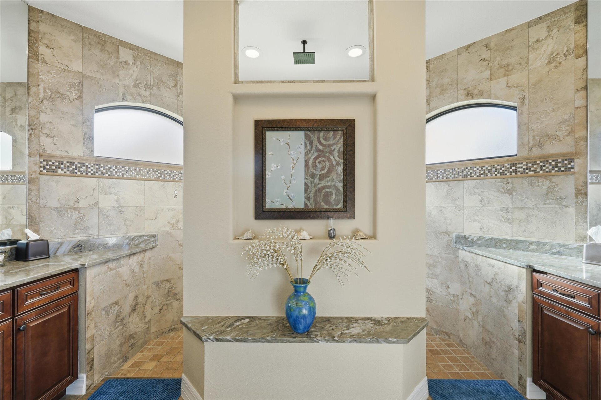 Primary en suite with large walk-in shower and double vanities