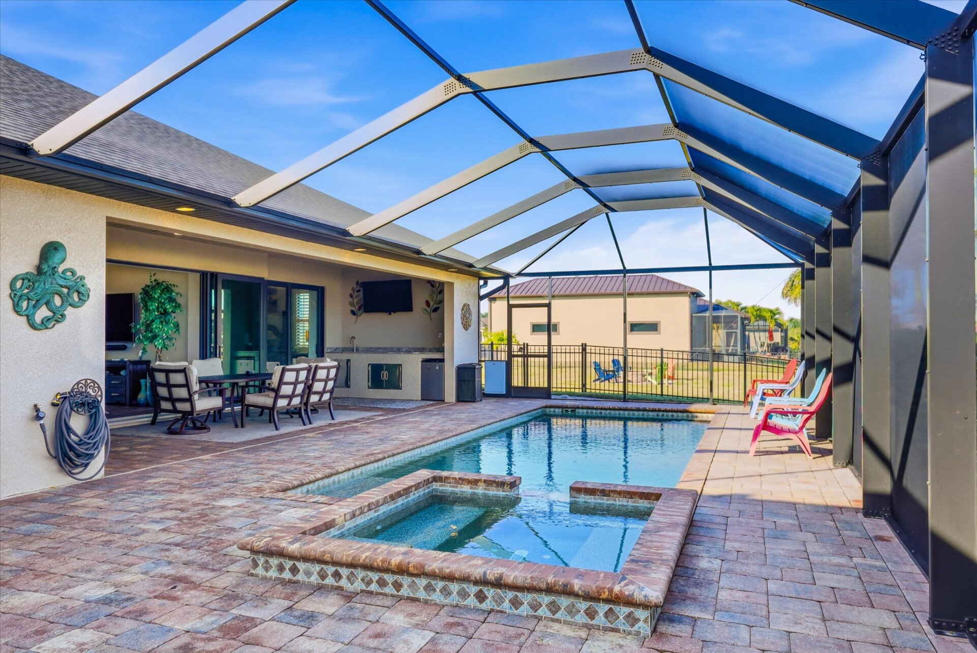 Sparkling saltwater pool & spa overlooking the canal