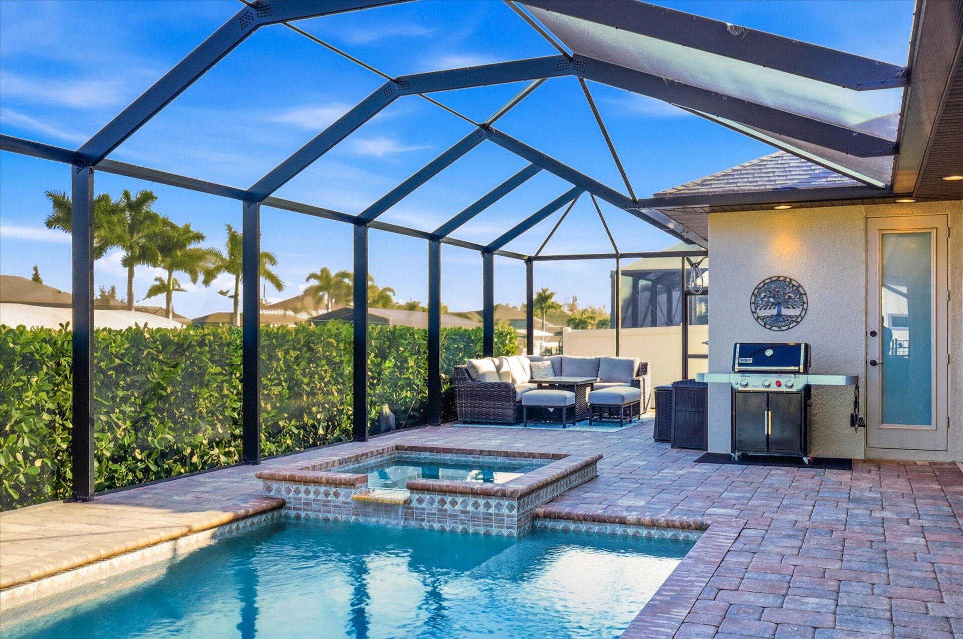 Sparkling saltwater pool & spa overlooking the canal