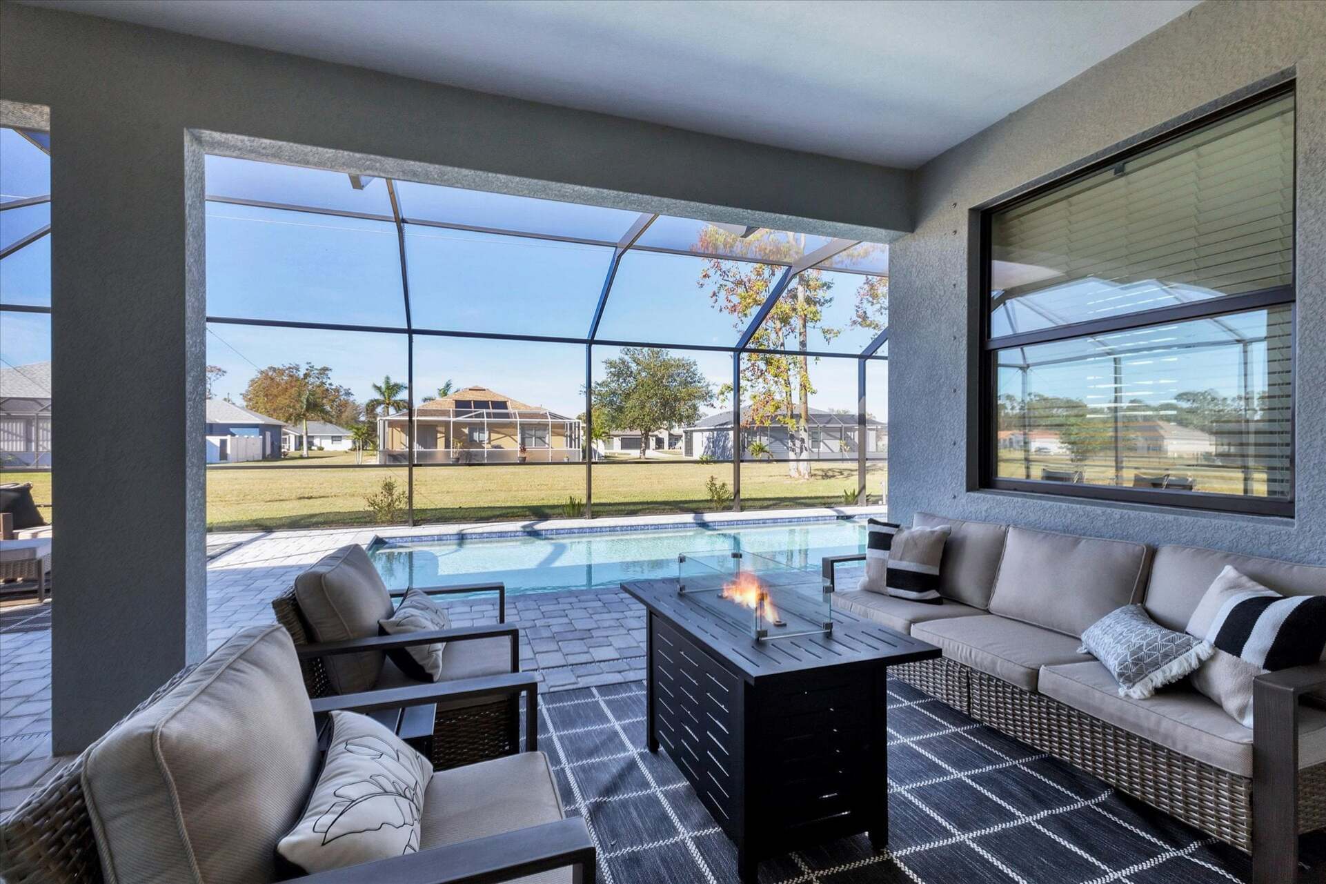 Spacious lanai with private pool. Lanai also features a table top fire pit, outdoor kitchen, sun loungers and dining table that seats 6
