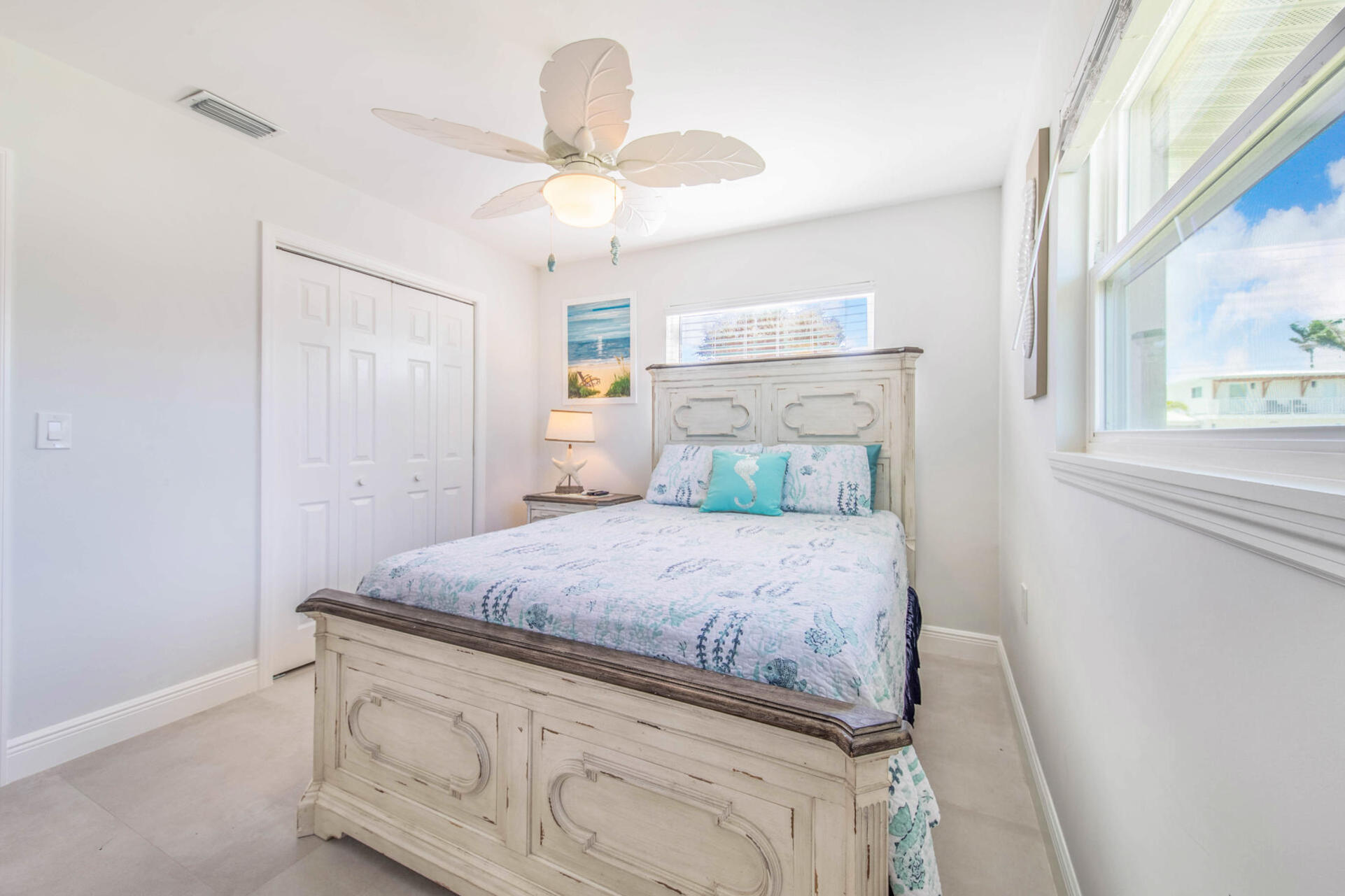 Bedroom 2 with queen bed and 39-inch Smart TV