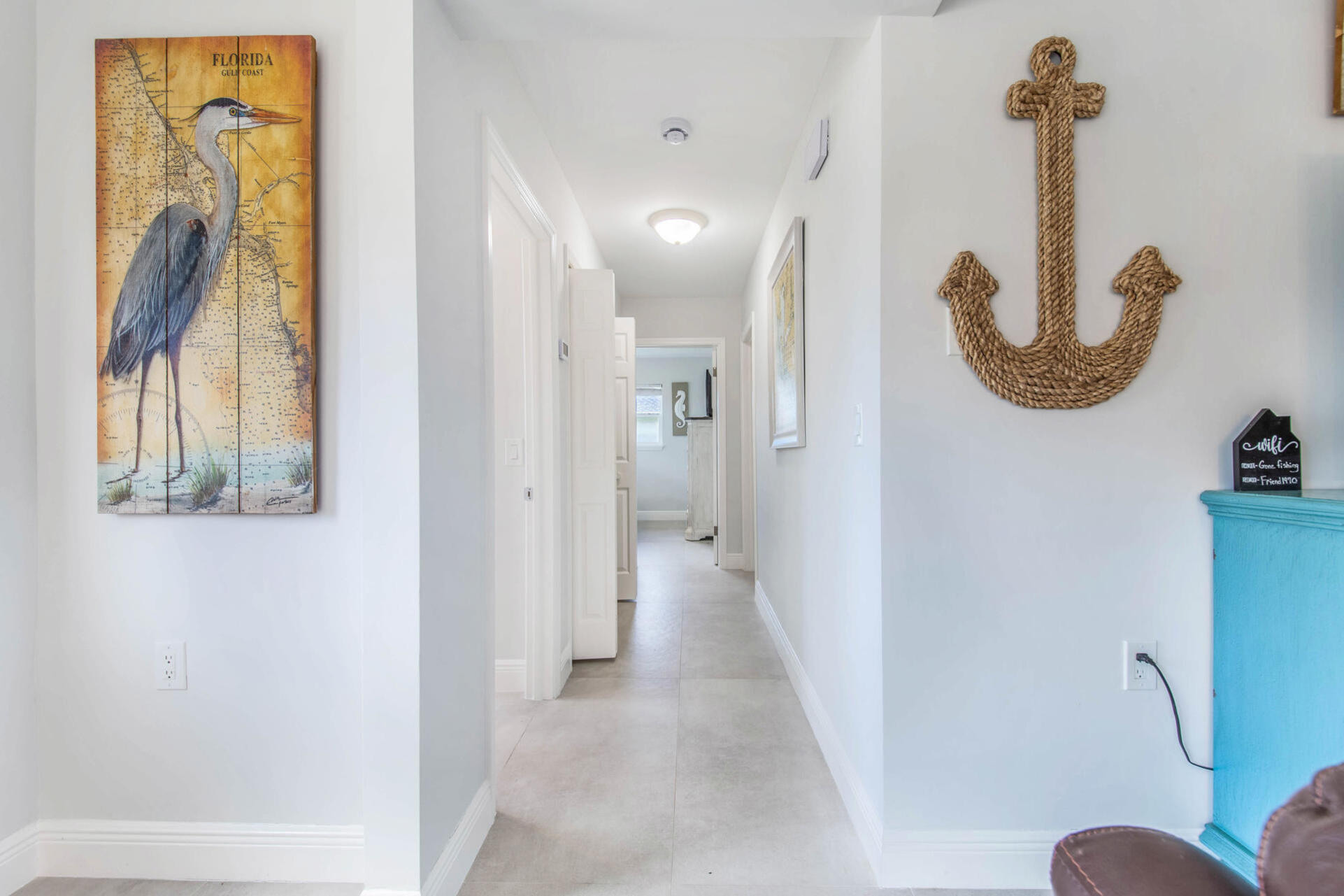 Hallway to primary bedroom and guest bedroom 1