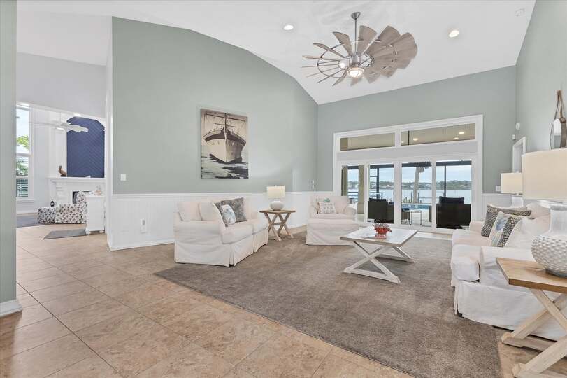 Living room overlooking the sparkling pool