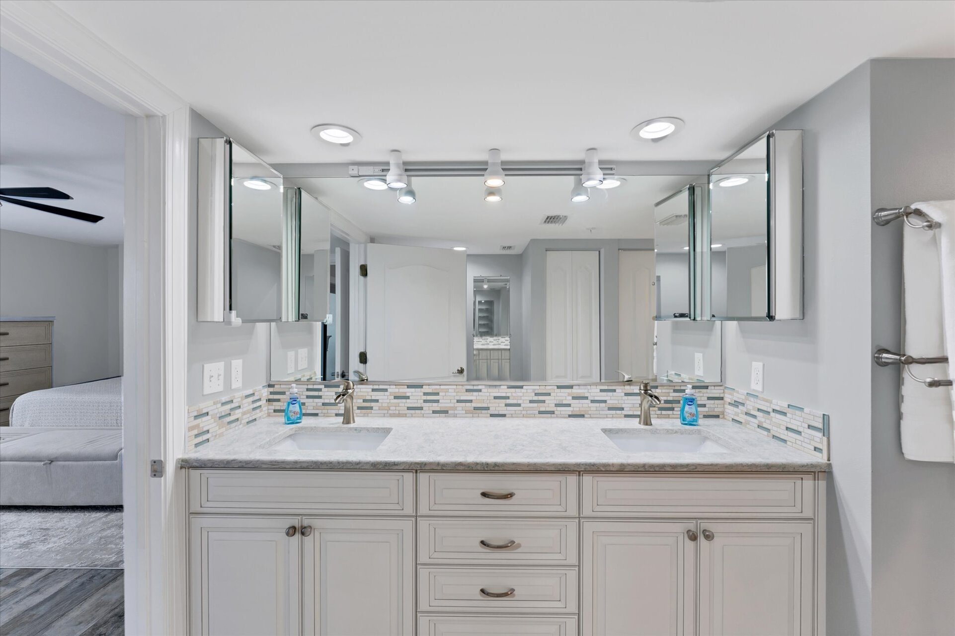 Primary Bathroom With Double Vanities and Walk-In Shower