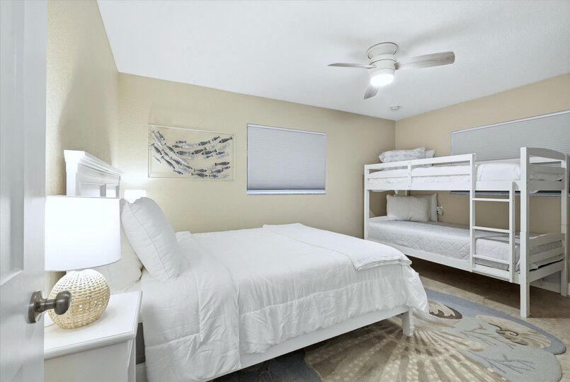 Bedroom 3 - Downstairs with one queen bed, one twin over twin bunkbed, and 40-inch Smart TV