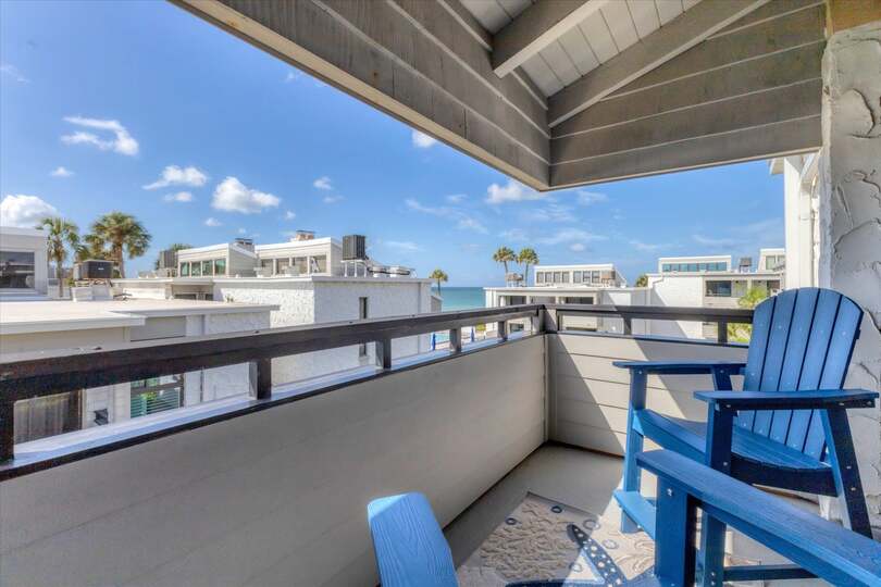 Balcony with view of pool and Gulf