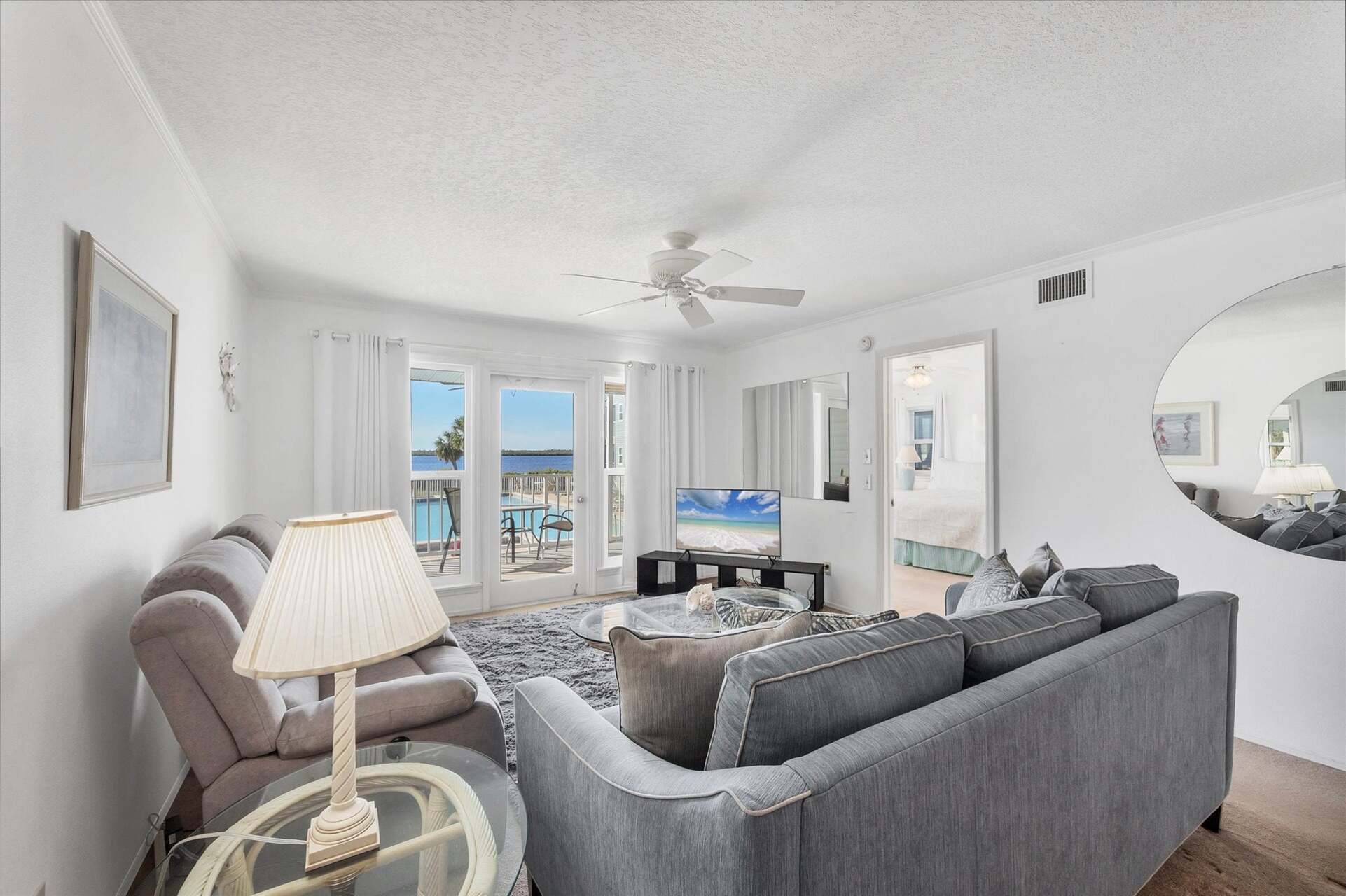 Open living space overlooking the community pool and Myakka River