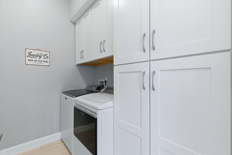 Laundry room with full-size washer & dryer