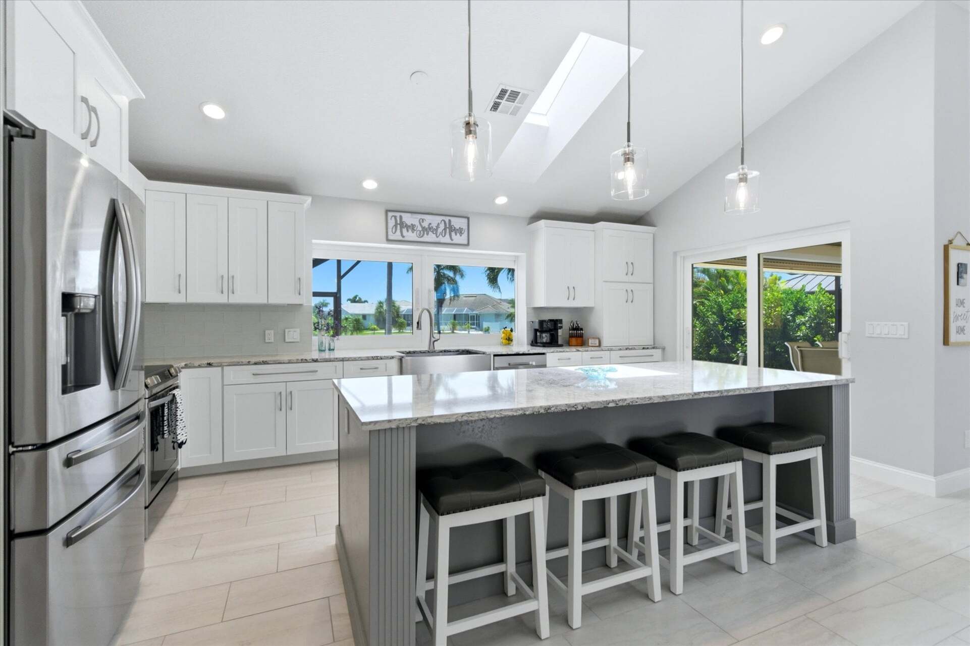 Beautiful, bright, fully-equipped kitchen with huge pass-through window